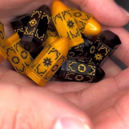 Wild Imaginary West RPG official bullet dice in hand